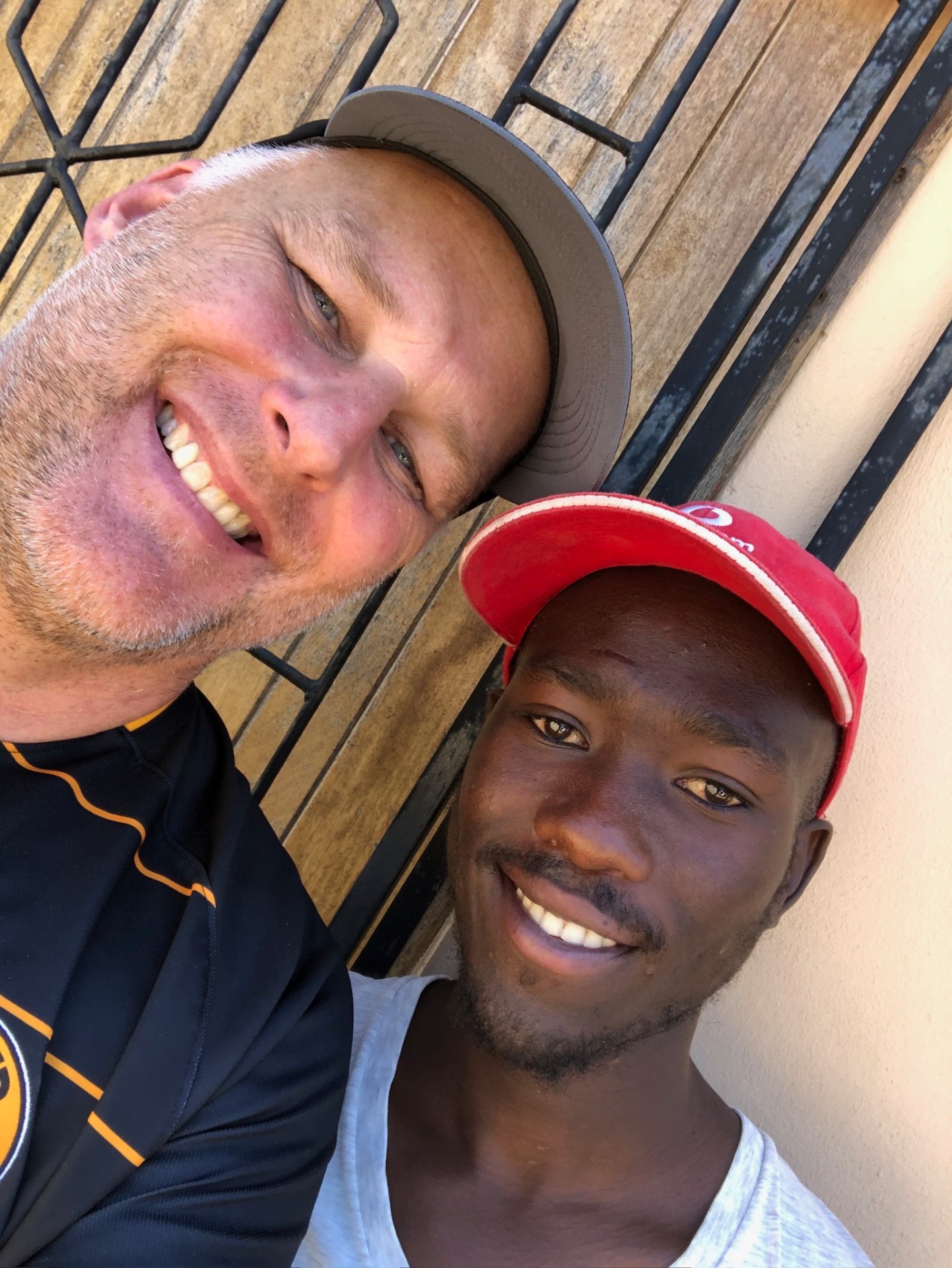 A friend of the mission and Nhlala Duma smiling for a selfie