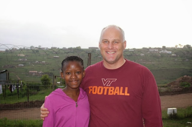 A friend of the mission with one of the Duma sisters, hills of Ntshongweni behind them