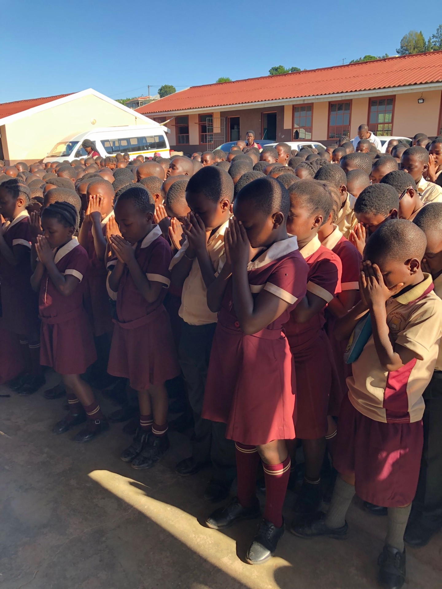 Ntshongweni students praying before the school day