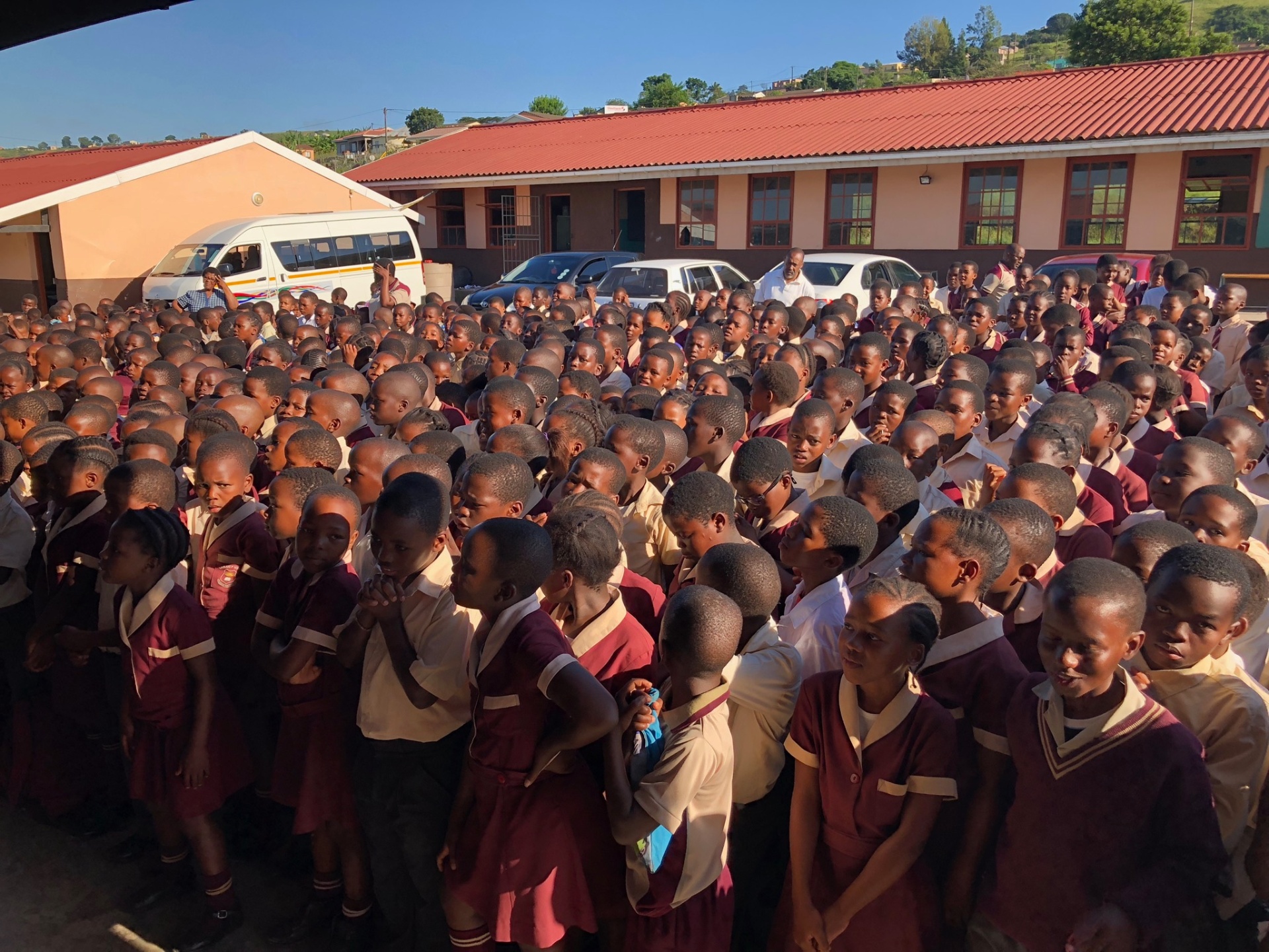 Wide view of students gathered for assembly