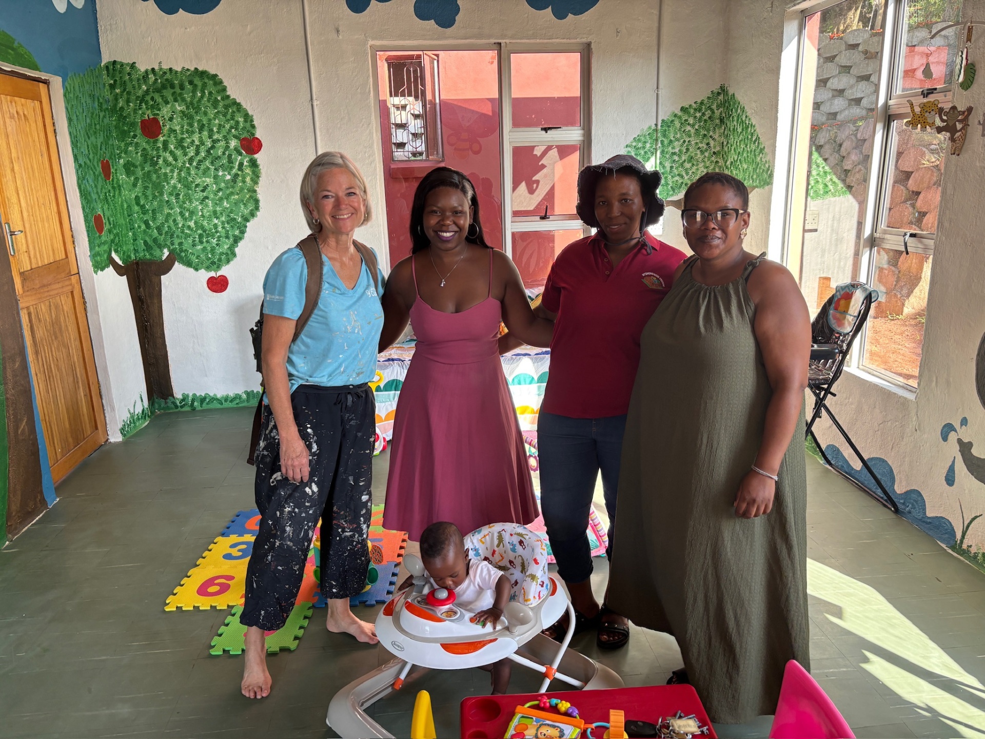 Crèche teachers and caregivers together in the classroom
