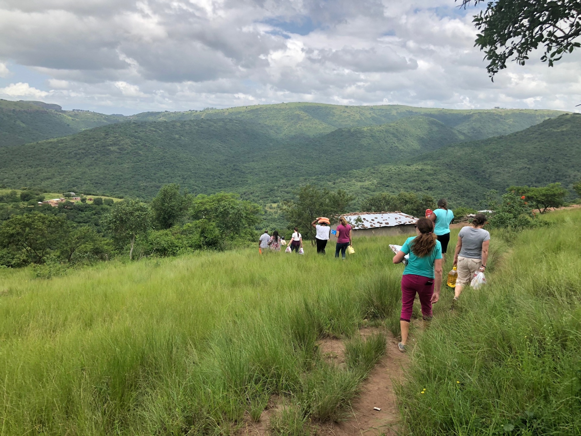 Walking the hills with food parcels