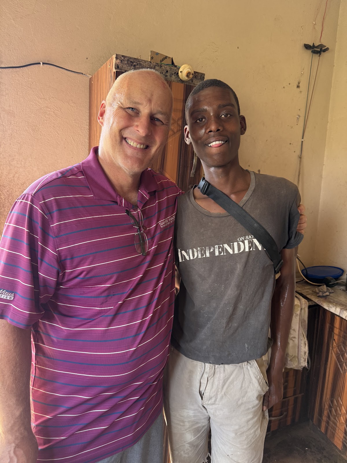 Gogo Zulu smiling during a food-support delivery
